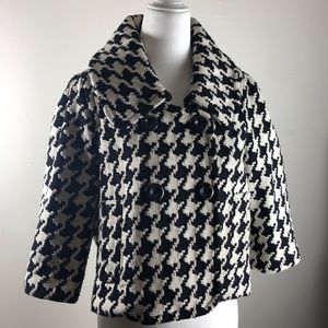 Black and white medium Priorities coat